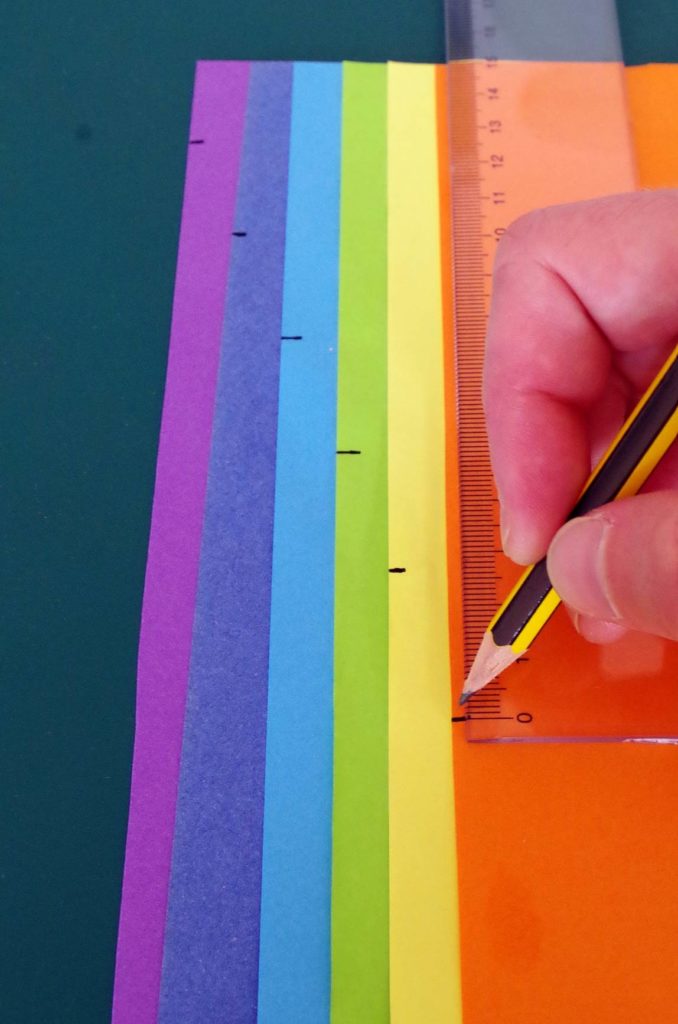 You may find it easier to mark the edges of the papers so you know where the glue needs to stop.