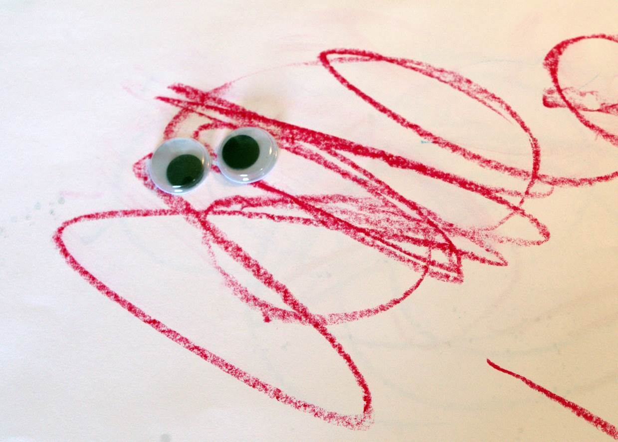 Scribble Creatures are made using a toddler's drawing skills with fine motor peelign and sticking of eyes.